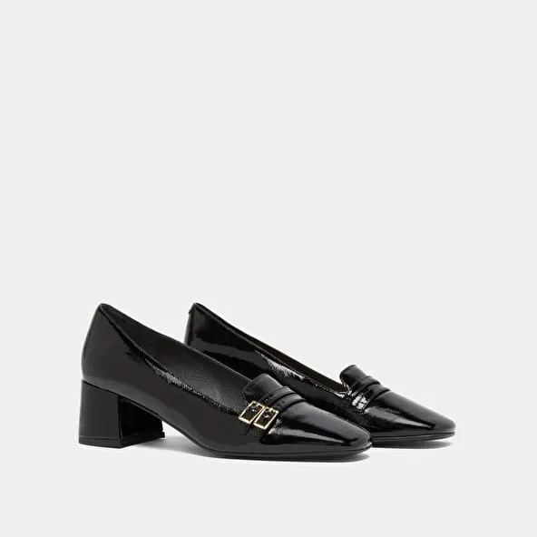 Heeled ballet flats in black pleated patent