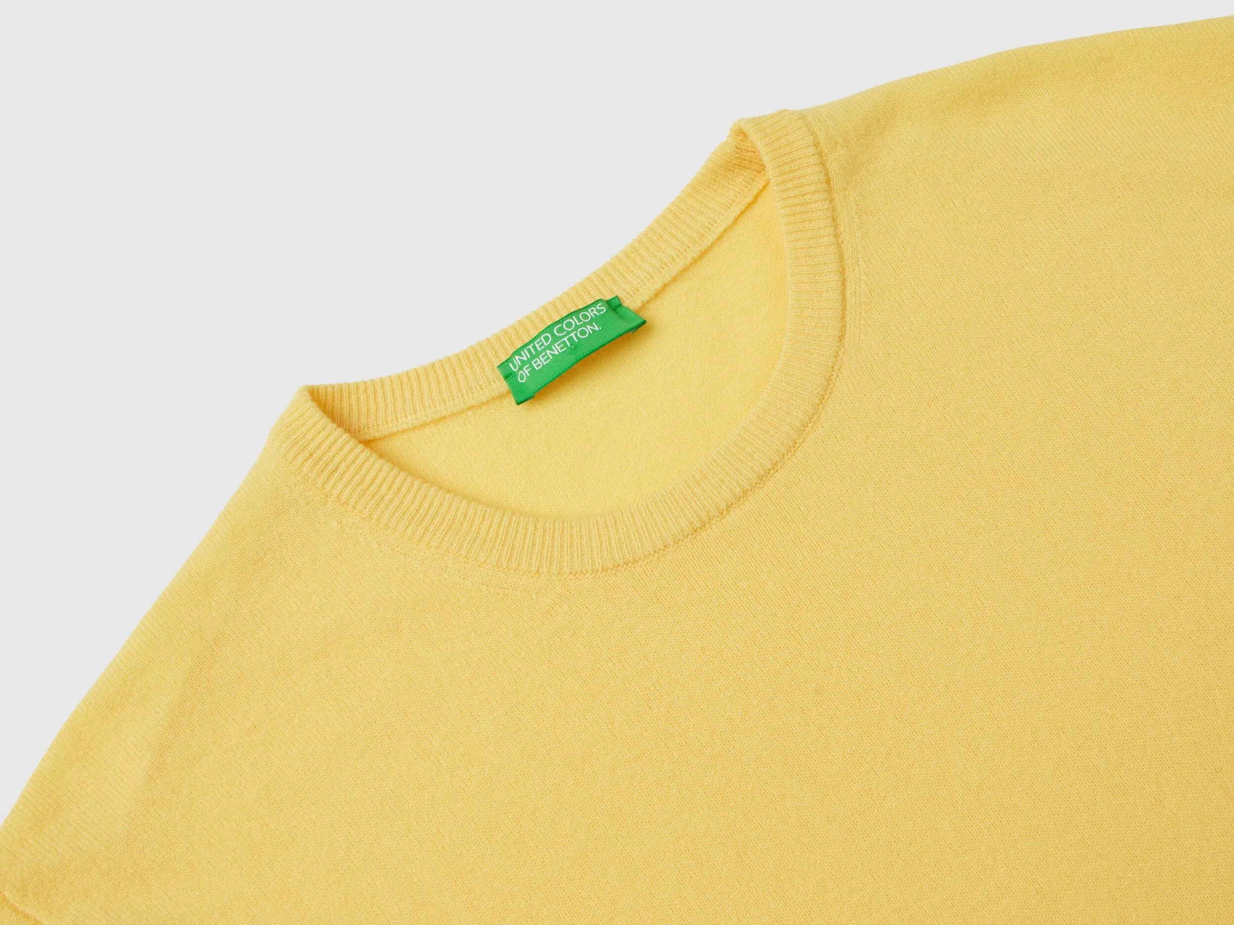 Yellow crew neck sweater in pure Merino wool - Yellow | Benetton